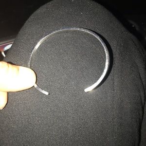 Bangle that says (JUST KEEP SWIMMING)